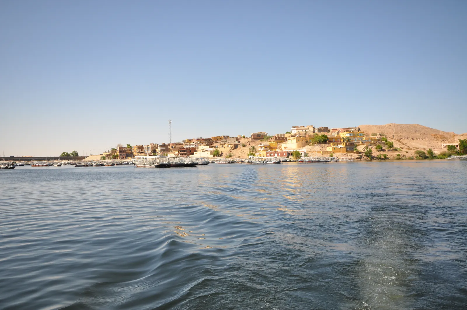 Another view of the Kiosk of Trajan at Philae Temple across the water, nearly identical to a companion photo.